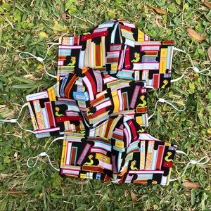 One (1) book worm/ teacher adult face mask